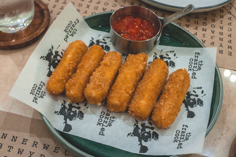 Cheesy Breadsticks with marinara dipping sauce